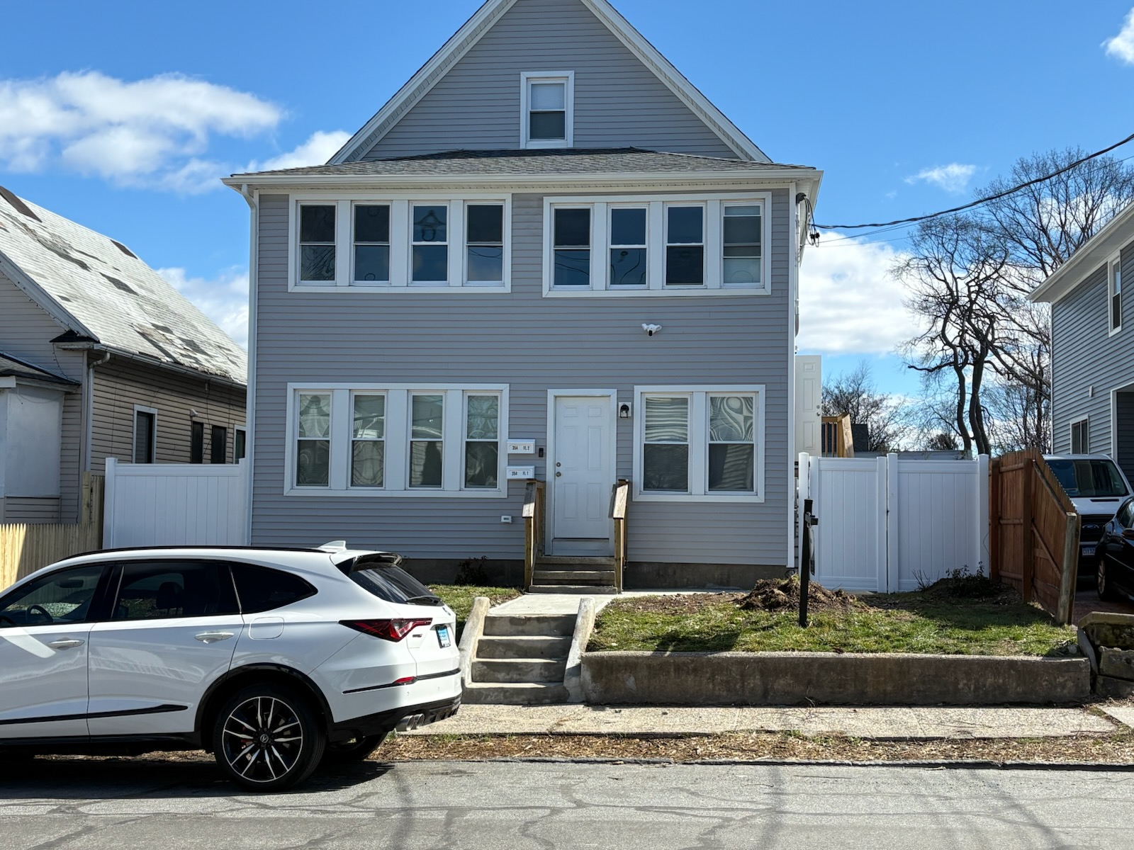354 Beechmont Ave, Bridgeport CT — grey multi-family house