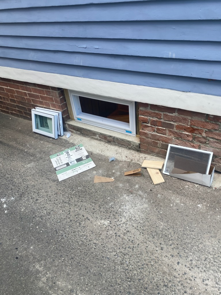 New basement egress window installation