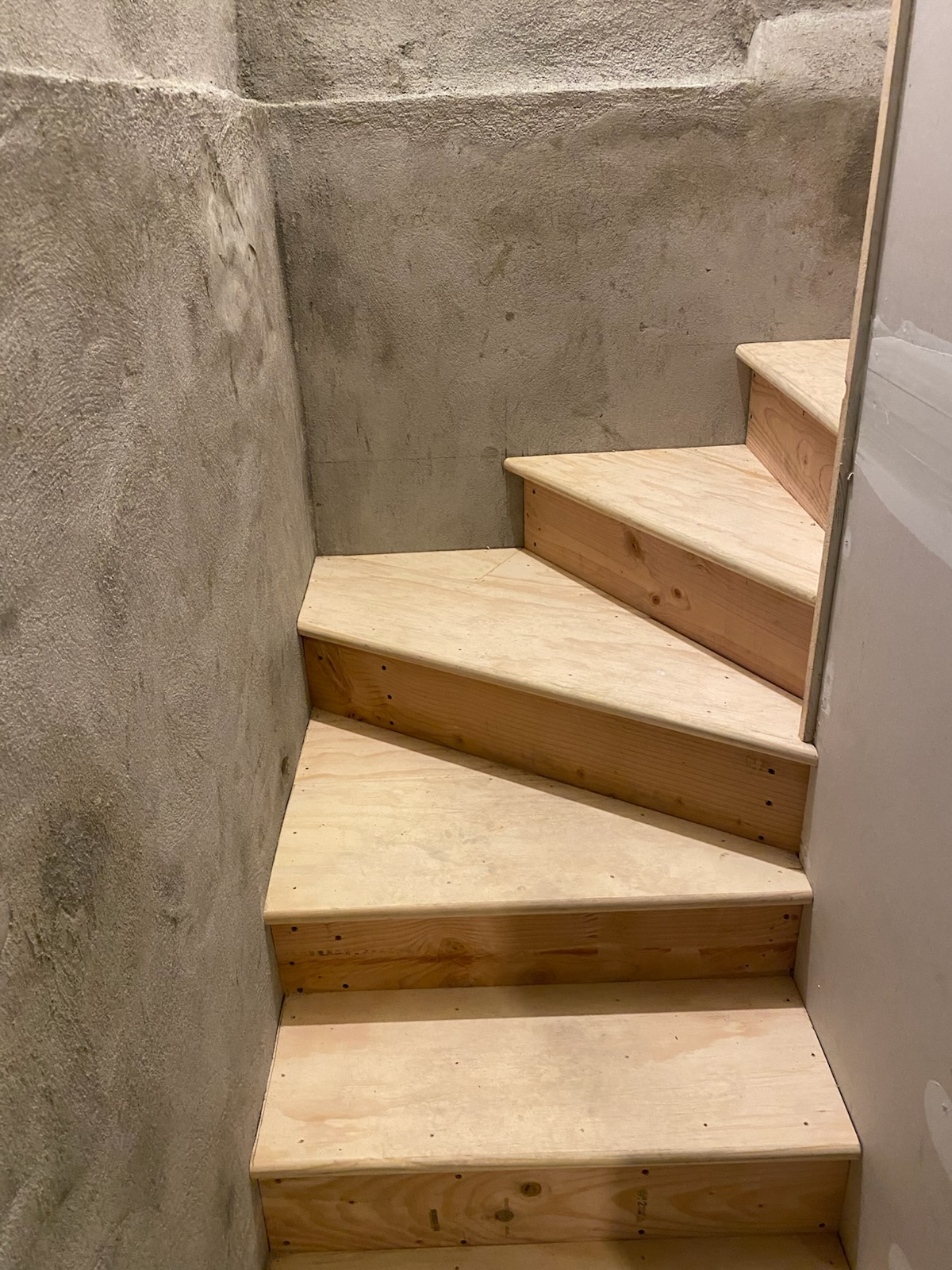 Finished basement stairs view 2