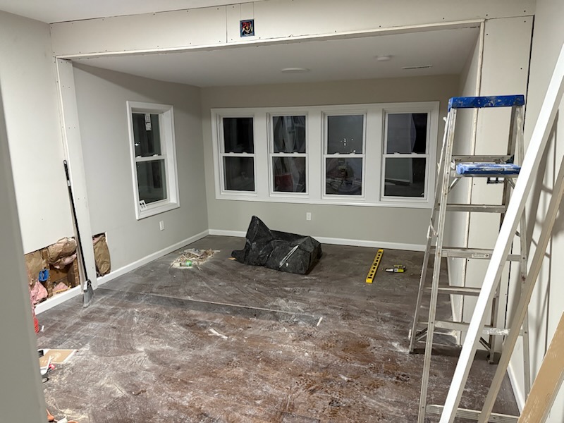 Living room with new windows during construction