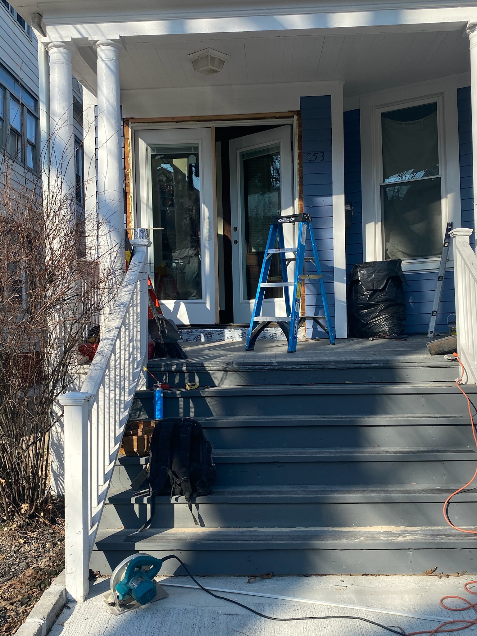 Front porch during trim replacement and restoration work